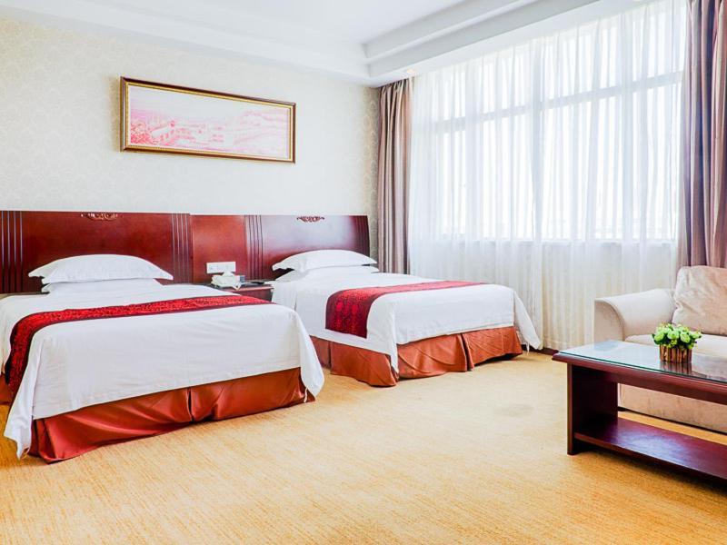 Vienna Hotel Wuxi Wangzhuang Road Esterno foto