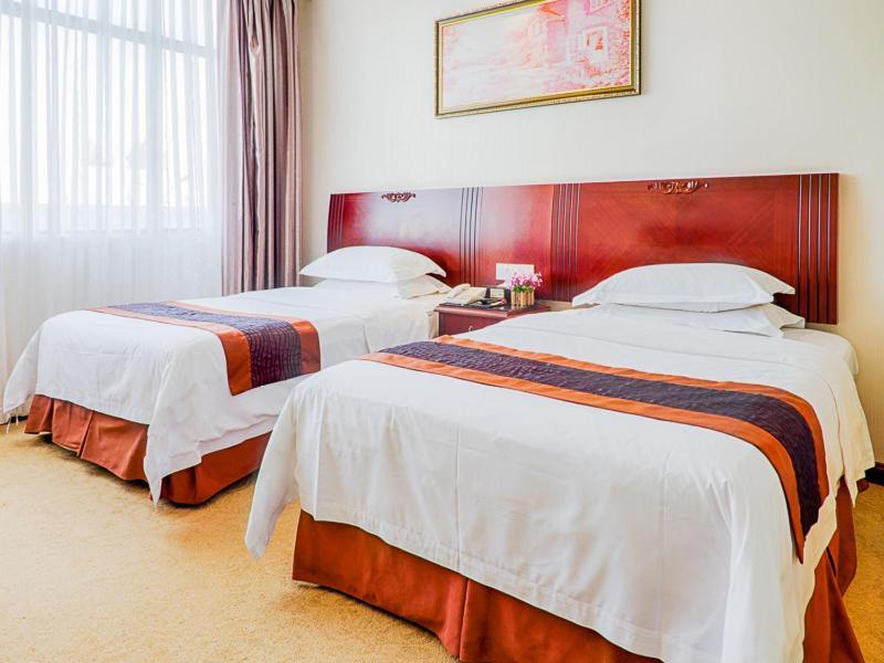 Vienna Hotel Wuxi Wangzhuang Road Esterno foto